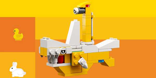 A LEGO® shark build against yellow background.